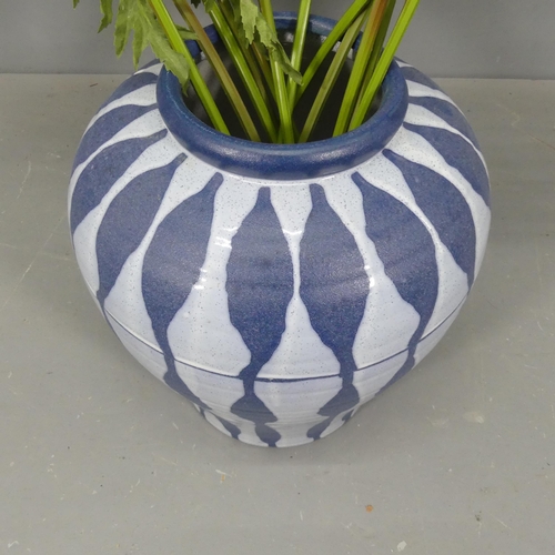 2292 - A large ceramic blue-ground studio vasem with white geometric design. 34x38cm