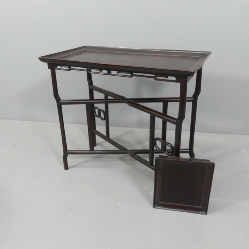 2299 - A Chinese mahogany rectangular tray top table on folding base, 74x66x39cm.