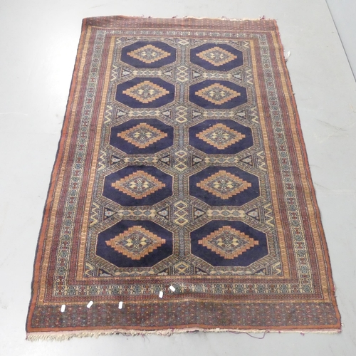 2330 - A red and blue-ground Kazak rug with geometric design. 184x122cm