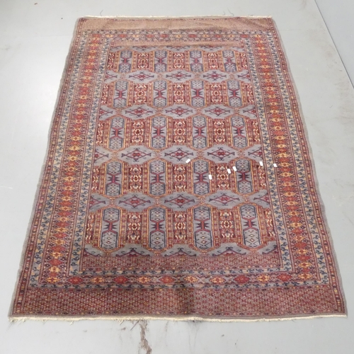 2331 - A red-ground Persian rug. 185x131cm