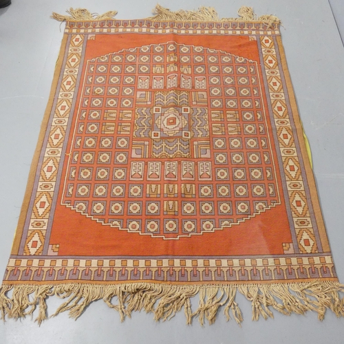 2332 - An Arts and Crafts knotted woollen rug, the rust ground with stylised geometric pattern