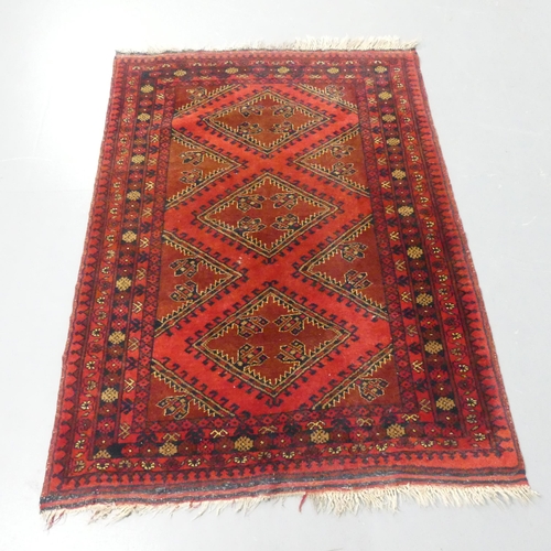 2341 - A red-ground Baluchi rug. 143x105cm.