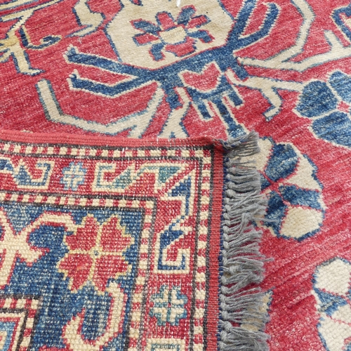 2344 - A red and cream-ground Ziegler carpet. 355x288cm.