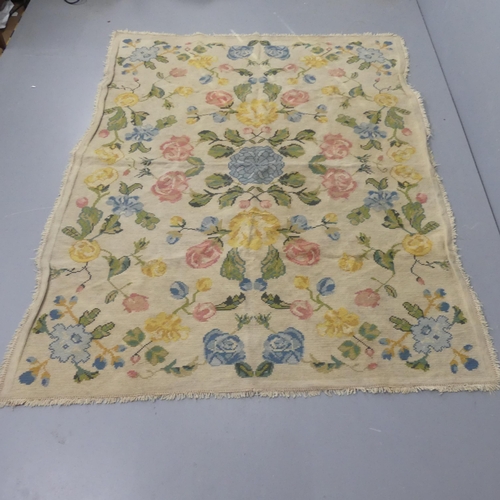 2350 - WHYLOCK & REID, EDINBURGH - An Arts and Crafts knotted woollen rug, with beige ground and stylised f... 