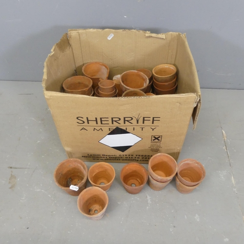 3428 - A quantity of approximately fifty terracotta garden pots, heights between 8-11cm.