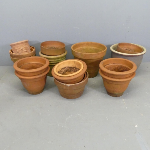 3429 - Twenty five assorted terracotta garden plant pots. Largest 37x42cm.