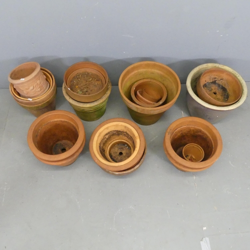 3429 - Twenty five assorted terracotta garden plant pots. Largest 37x42cm.