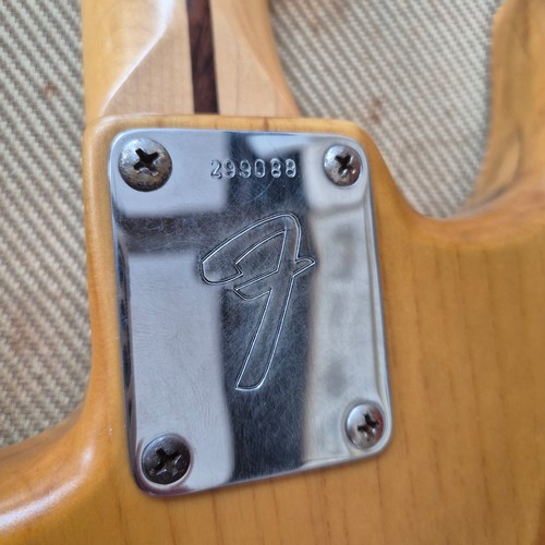 80 - WITHDRAWN 
A 1970s Fender Stratocaster natural electric guitar, serial no. 299088, in original fitte... 