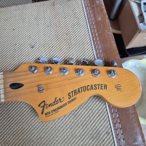 80 - WITHDRAWN 
A 1970s Fender Stratocaster natural electric guitar, serial no. 299088, in original fitte... 