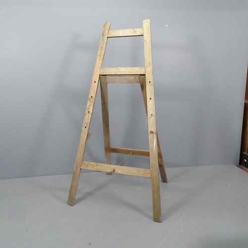 2362 - A floor-standing folding easel. Height 176cm.