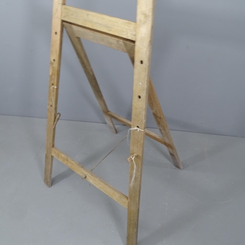 2362 - A floor-standing folding easel. Height 176cm.