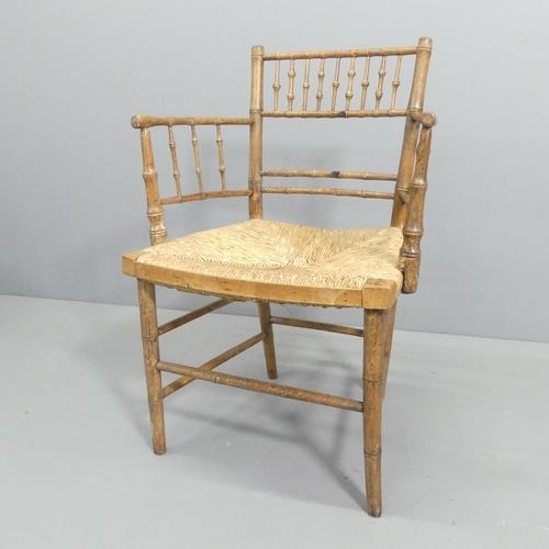 2367 - A 19th century faux-bamboo rush-seated Sussex chair. A/F