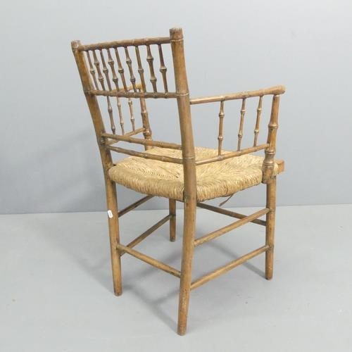 2367 - A 19th century faux-bamboo rush-seated Sussex chair. A/F