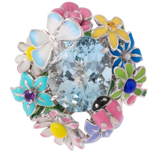 19 - CHRISTIAN DIOR - An Aquamarine and Enamel 'Diorette' Ring,

set with an oval mixed-cut aquamarine wi... 