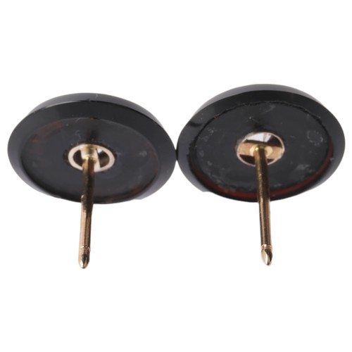 18 - A Pair of Art Deco Onyx and Diamond Stud Earrings,

each round onyx panel centrally set with an old ... 