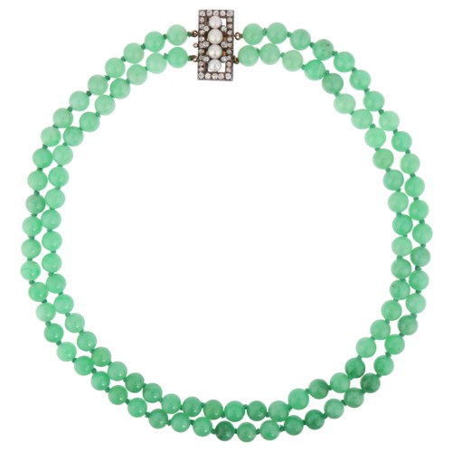 21 - A Jadeite Jade, Pearl and Diamond Necklace,

comprising two rows of even sized knotted jade beads me... 