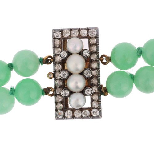 21 - A Jadeite Jade, Pearl and Diamond Necklace,

comprising two rows of even sized knotted jade beads me... 