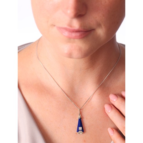 6 - An Art Deco Lapis Lazuli and Diamond Pendant Necklace,

of arrowhead form set with a triangular face... 