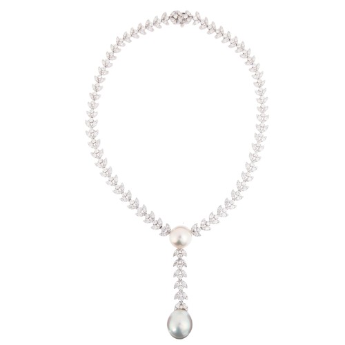 15 - A South Sea Pearl and Diamond Necklace,

the central drop set with round cultured pearl measuring ap... 