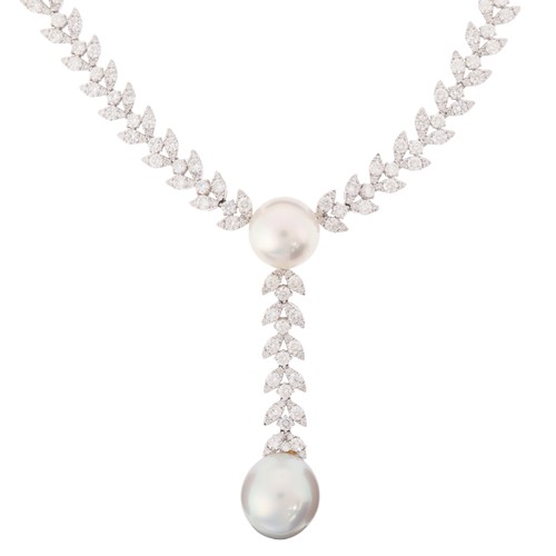 15 - A South Sea Pearl and Diamond Necklace,

the central drop set with round cultured pearl measuring ap... 