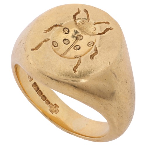 60 - A Gold 'Ladybug' Seal Signet Ring,

the central oval panel intaglio carved with a ladybug, by Ruffs ... 