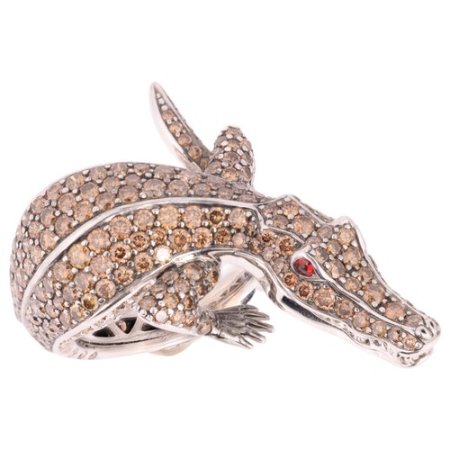 11 - ROBERTO COIN - A Cinnamon Diamond 'Animalier' Crocodile Ring,

designed as a crocodile with curled t... 