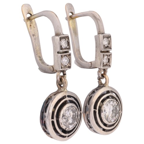 53 - A Pair of Diamond Earrings,

each set with a 0.40 carat modern round brilliant cut diamond target dr... 