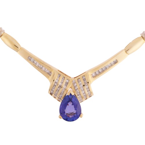 55 - A Tanzanite and Diamond Collar Necklace,

set with a pear cut Tanzanite weighing approximately 5.00 ... 