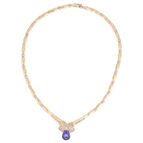 55 - A Tanzanite and Diamond Collar Necklace,

set with a pear cut Tanzanite weighing approximately 5.00 ... 