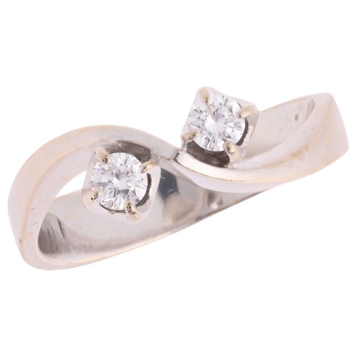 58 - GEORG JENSEN & WENDEL - A 'Toi et Moi' Diamond Ring,

Danish, set with two modern round brilliant cu... 