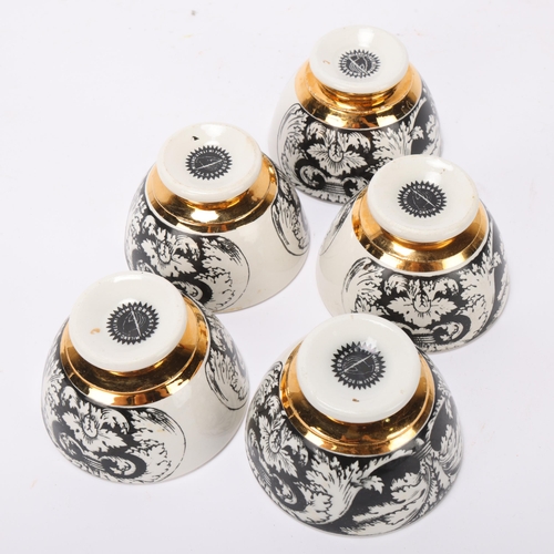 104 - A set of 5 PIERO FORNASETTI (1913-88) tea bowls, with gilded foot rim, makers marks to base, diamete... 