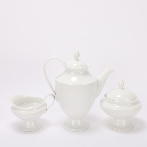 117 - A KPM Berlin white glaze porcelain coffee set, coffee pot, milk jug, sugar bowl and 6 cups, makers m... 