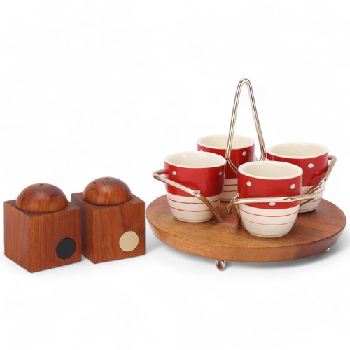 118 - A mid 20th century teak salt and pepper set together with a Wyncraft teak based egg cup stand with l... 