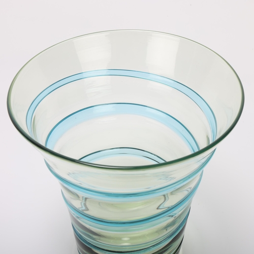 12 - BARNABY POWELL (1891-1939) for Whitefriars, a pale blue and green swirl flared form glass vase, heig... 