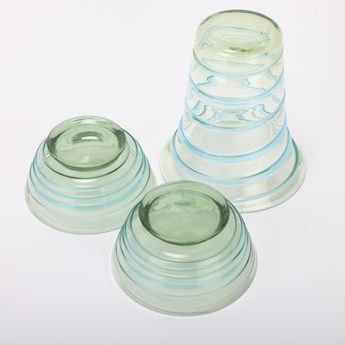 13 - BARNABY POWELL (1891-1939) for Whitefriars, a pair of pale blue and green swirl glass bowls and a fl... 