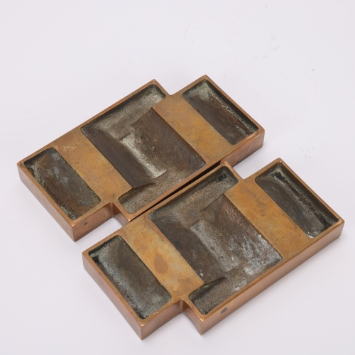 31 - A pair of modernist bronze cast ashtrays, no makers marks, length 13cm