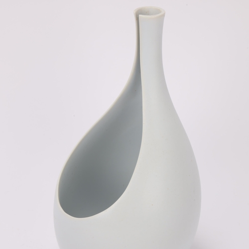 42 - STIG LINDBERG (1916-1981) for Gustavsberg, Sweden, a 1950s' designed white glaze Pungo vase, makers ... 