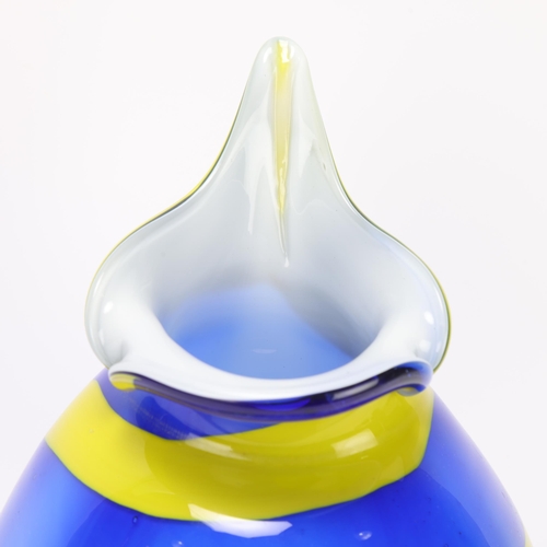 51 - A mid 20th century studio glass vase, with encased yellow/blue swirl and spout rim, no makers mark, ... 