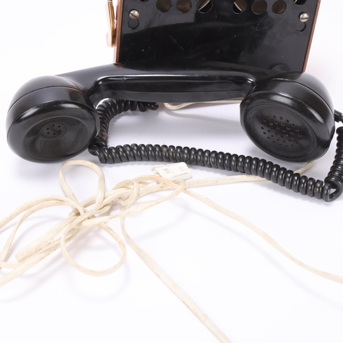 52 - A Vintage copper plate telephone with brass carry handle and dial