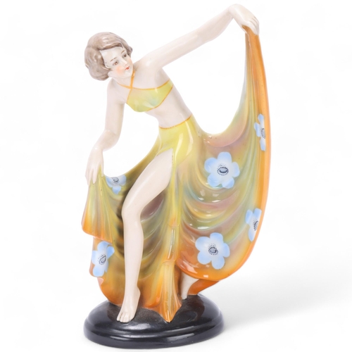 61 - An Art Deco porcelain figure of a dancing woman, possibly Fasold and Stauch, no makers mark, numbere... 