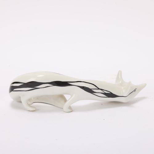 87 - MIECZYSLAW NARUSZEWICZ for Cmielow, Poland, a 1950's porcelain stalking fox, numbered to base w-17/2... 