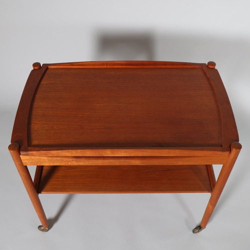 14 - POUL HUNDEVAD, a mid 20th century teak tray top two tier tea trolley, height 73cm, top 62x43cm