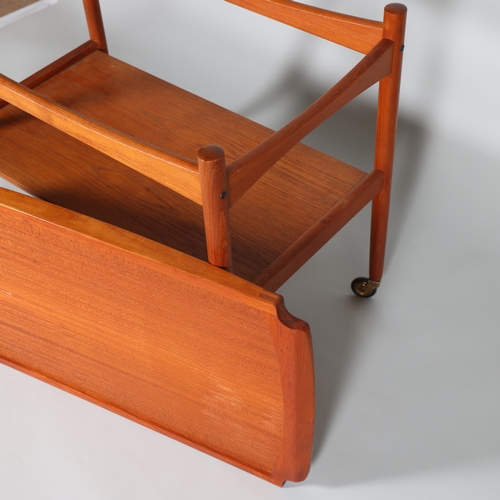 14 - POUL HUNDEVAD, a mid 20th century teak tray top two tier tea trolley, height 73cm, top 62x43cm