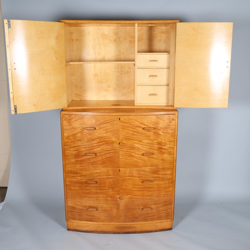 15 - A fine quality handmade 1930s Art Deco tall boy, the concave front cabinet on bow front chest, the f... 