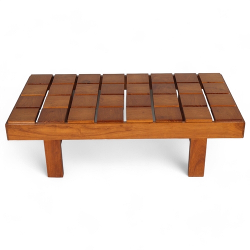 168 - A mid-century walnut coffee table with unusual floating squares top, height 37cm, top 60 x 120cm