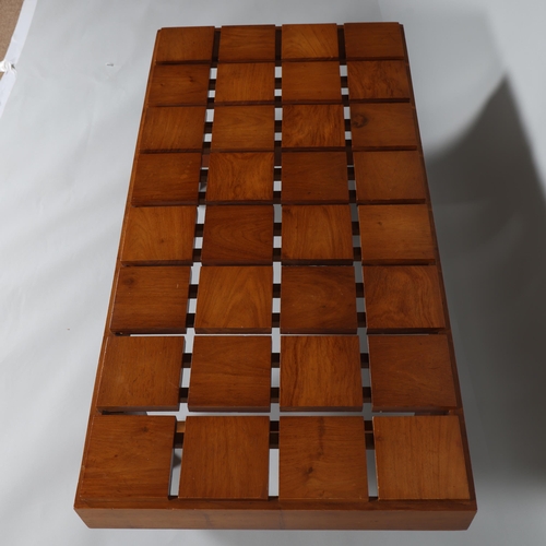 168 - A mid-century walnut coffee table with unusual floating squares top, height 37cm, top 60 x 120cm