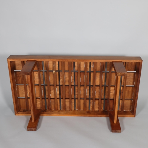 168 - A mid-century walnut coffee table with unusual floating squares top, height 37cm, top 60 x 120cm