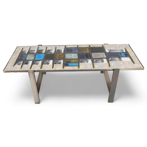 244 - JULIETTE BELARTI, 1970s' tile top coffee table, on polished steel frame, signed in corner, top 125 x... 