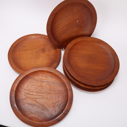 205 - A set of 8 mid-century Danish design teak platters, diameter 26cm