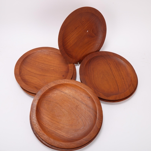 205 - A set of 8 mid-century Danish design teak platters, diameter 26cm